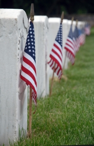 american flags at graves on Memorial Day